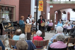 Pepe Santana elicits the help of Rena Fruchter and volunteer at the Waveny Care Center in Connecticut