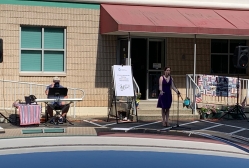 Vocalist-Jody-Mullen-and-keyboard-player-Bruce-Van-Hoven-perform-a-parking-lot-concert-during-COVID-19-for-the-JFK-Adult-Day-Program-in-Edison