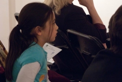 Young audience member enthralled by an MFAS progam